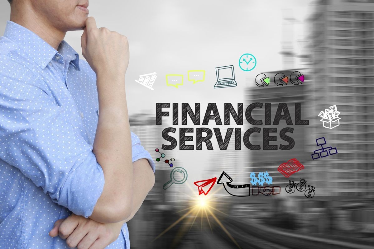 young man stand and thinking with FINANCIAL SERVICE text young man stand and thinking with FINANCIAL SERVICE text